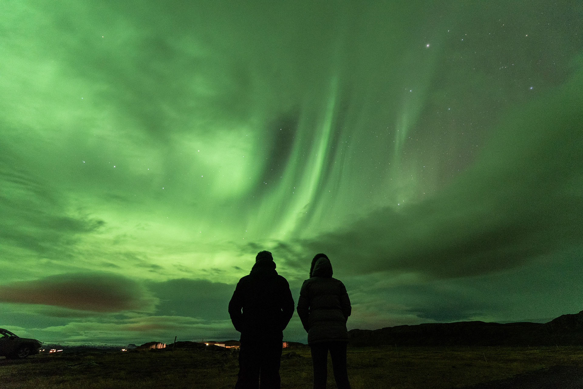 people watching the aurora. The best place to see the northern lights is with someone you love.