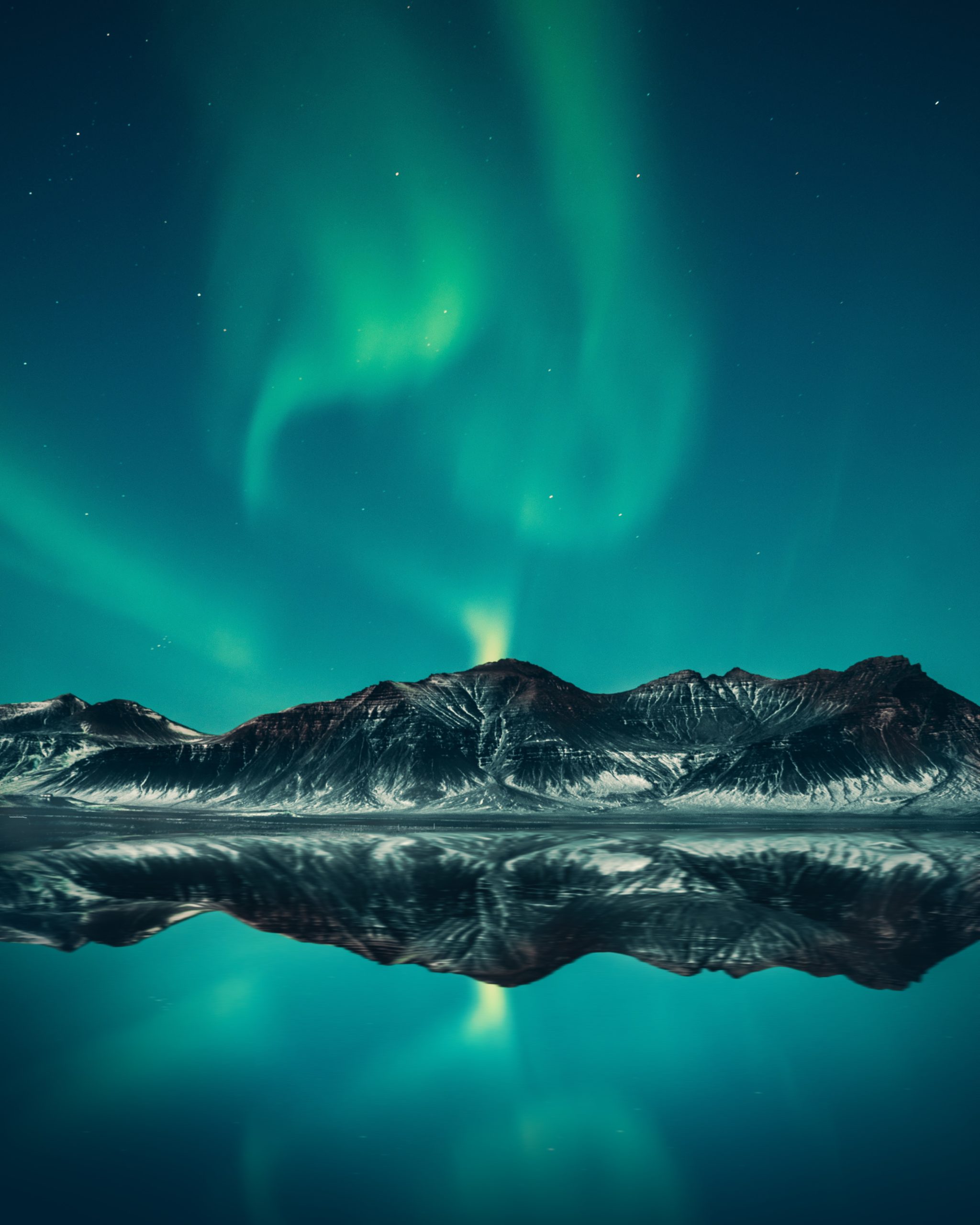 Northern Lights over an Icelandic mountain