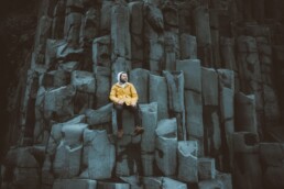 A man photographed at Reynisfjara beach in Iceland