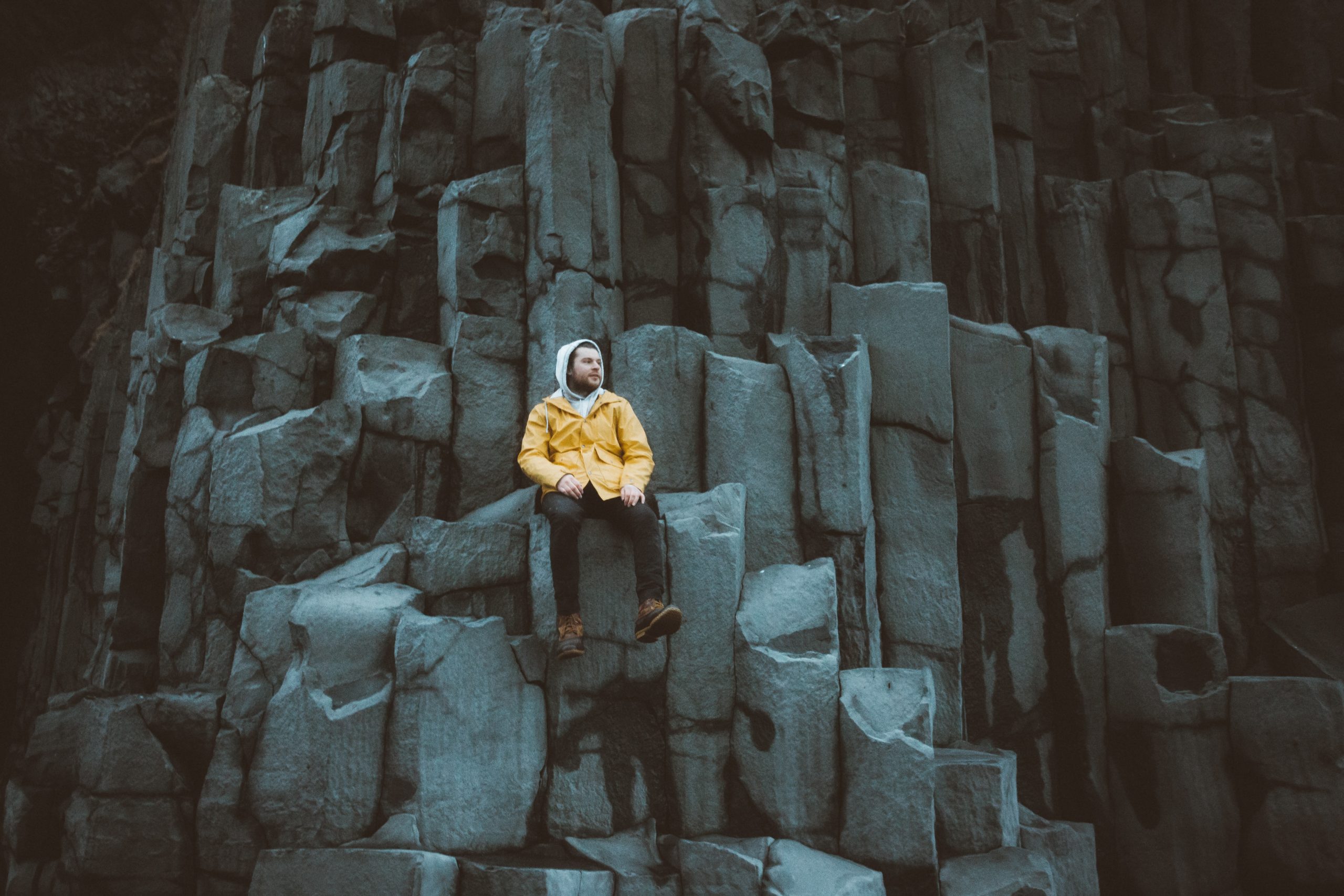 A man photographed at Reynisfjara beach in Iceland