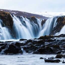 The waters of Brúarfoss waterfall