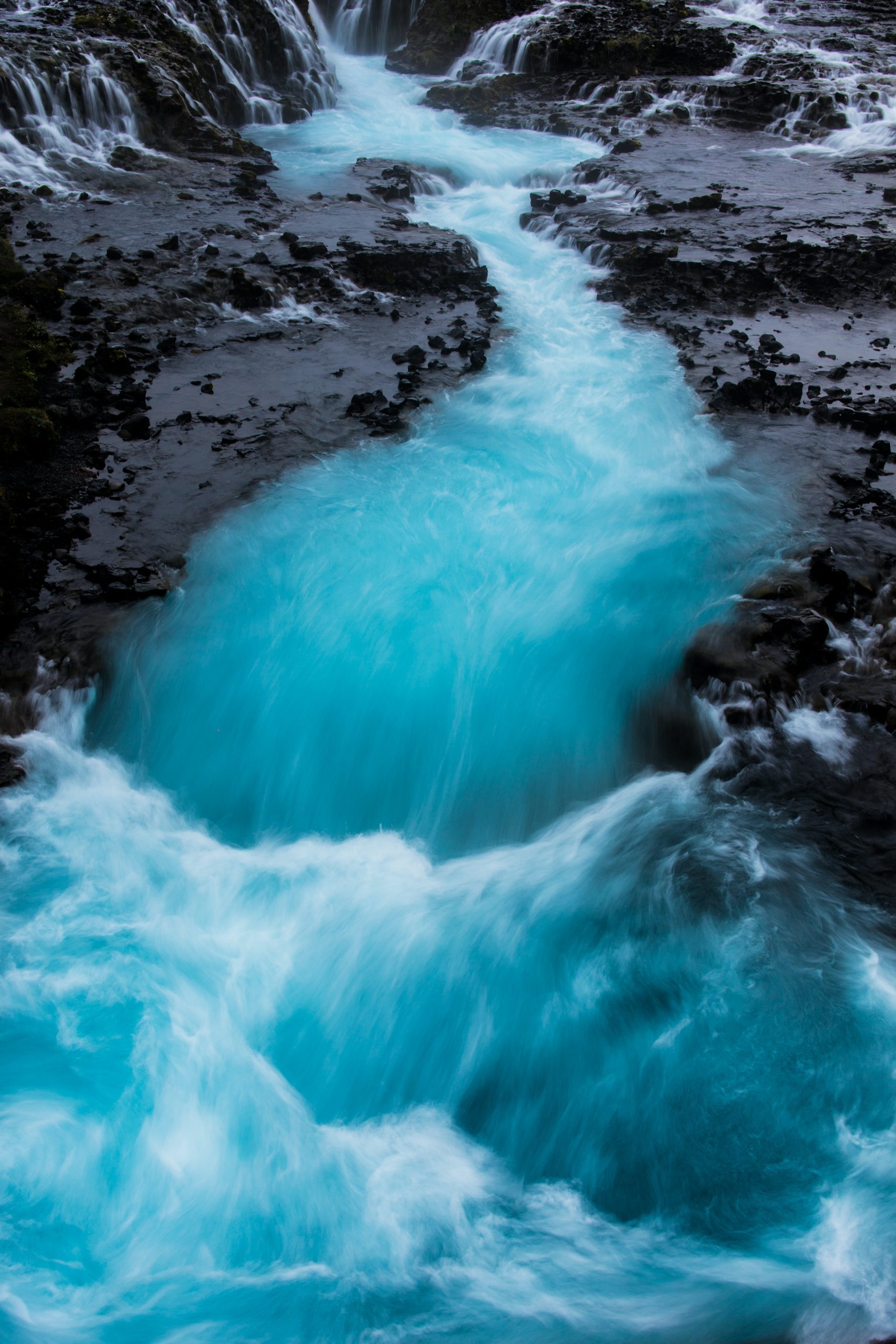 The aquamarine colour of Brúarfoss waterfall