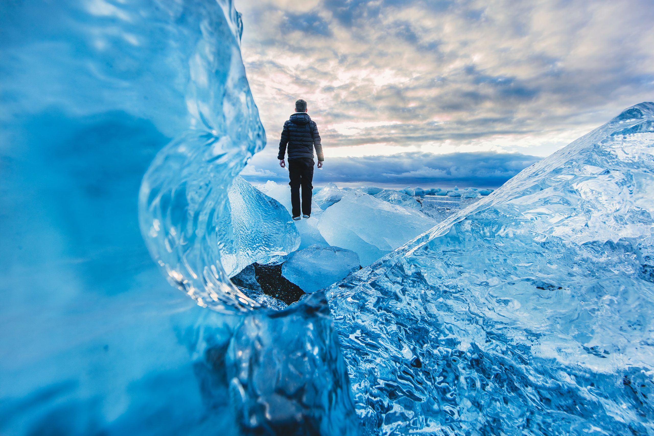 Person seen through glacial ice